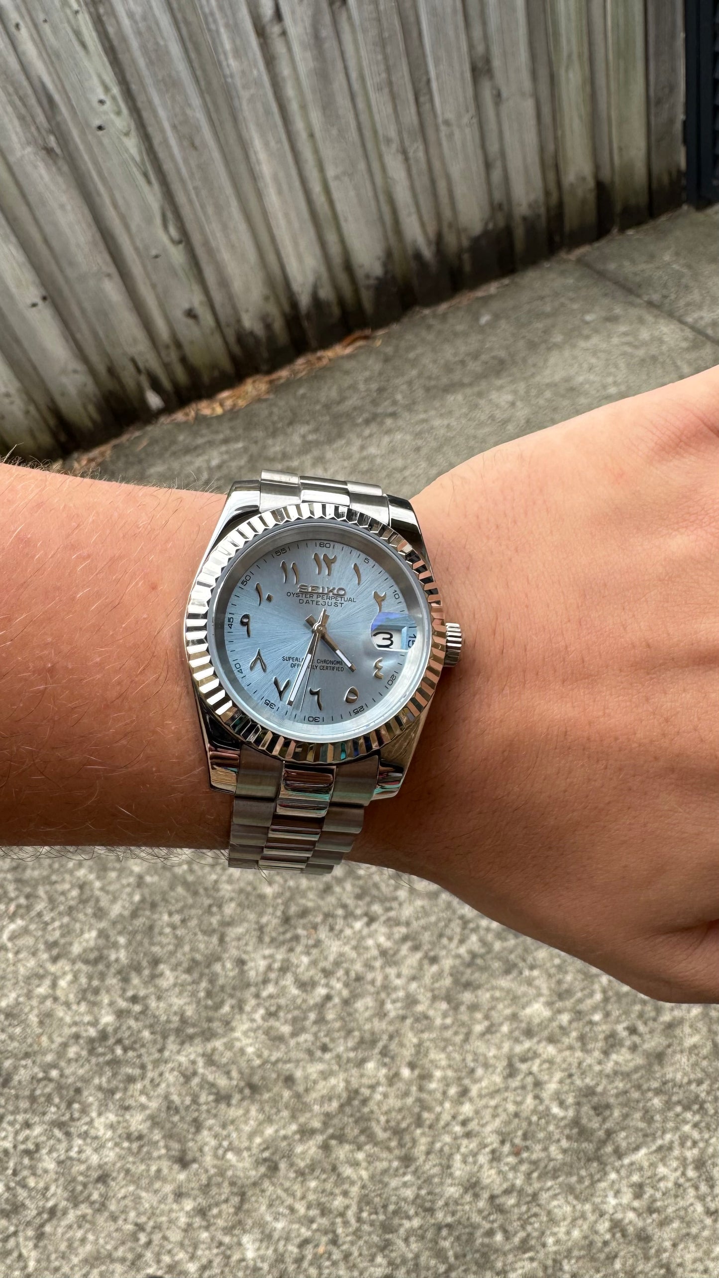 Ice Blue Arabic Dial Perpetual SeikoJust Stainless Steel