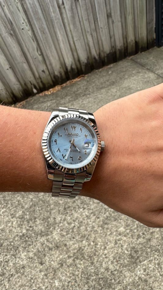 Ice Blue Arabic Dial Perpetual SeikoJust Stainless Steel